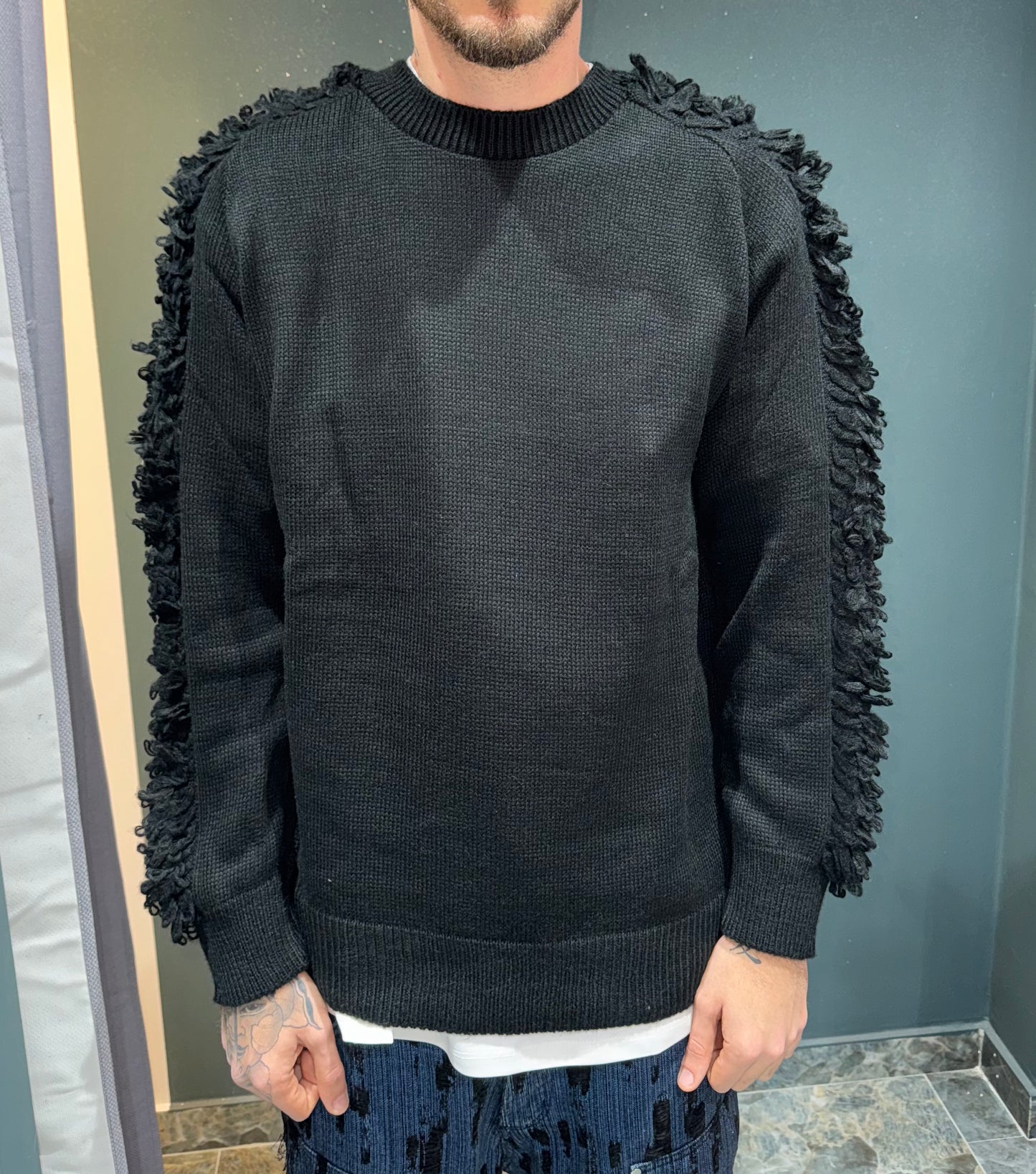 Maglione sfrangiato