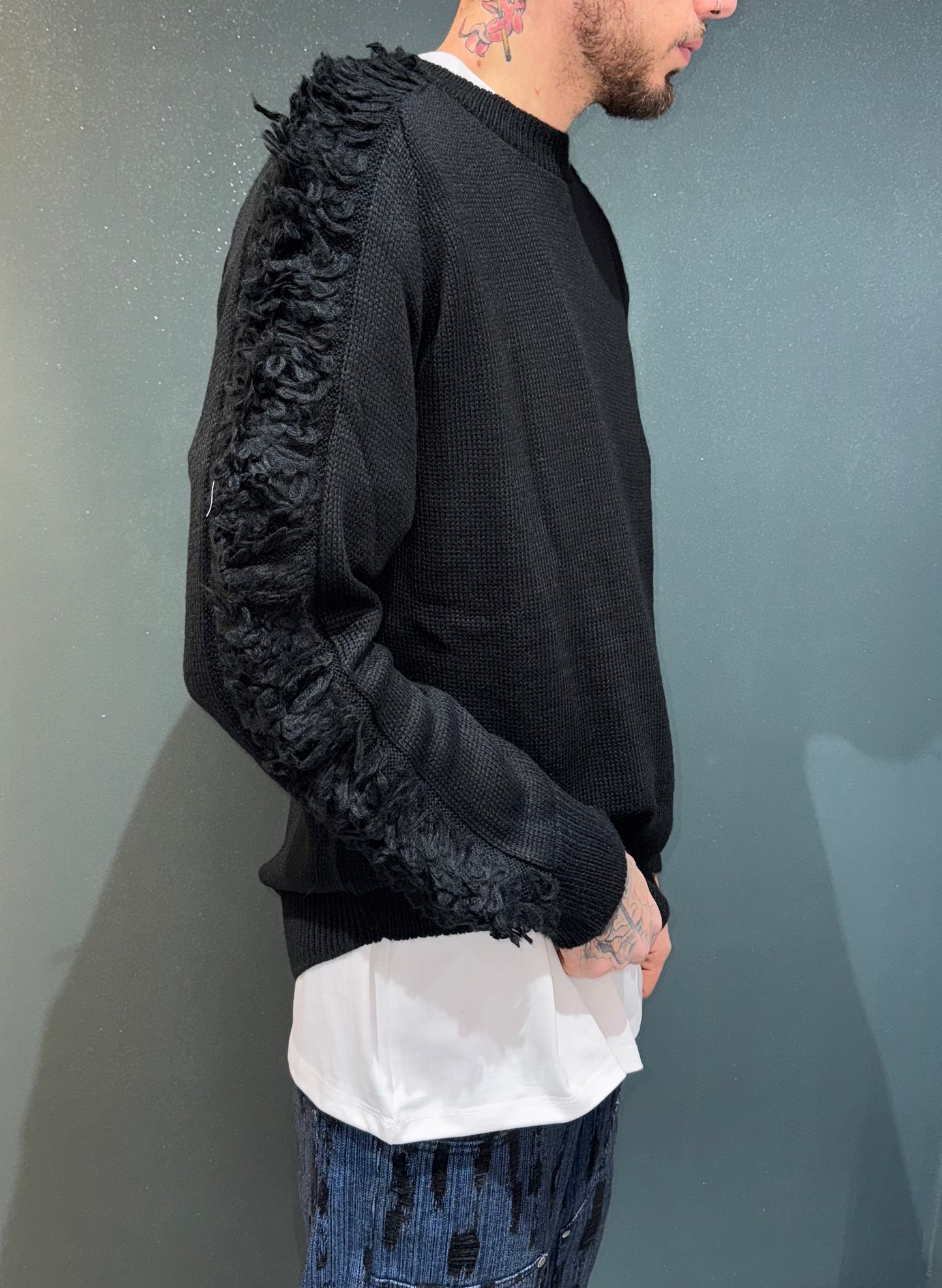 Maglione sfrangiato