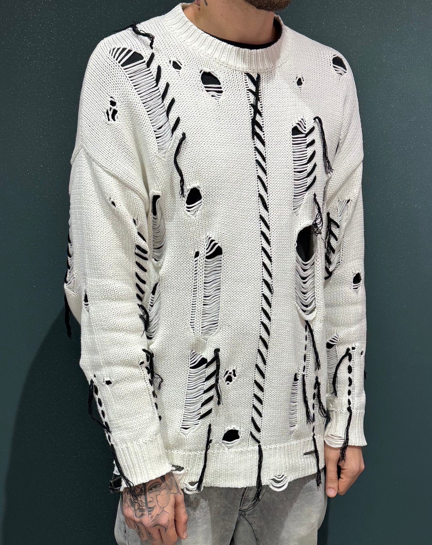 Maglione sfrangiato
