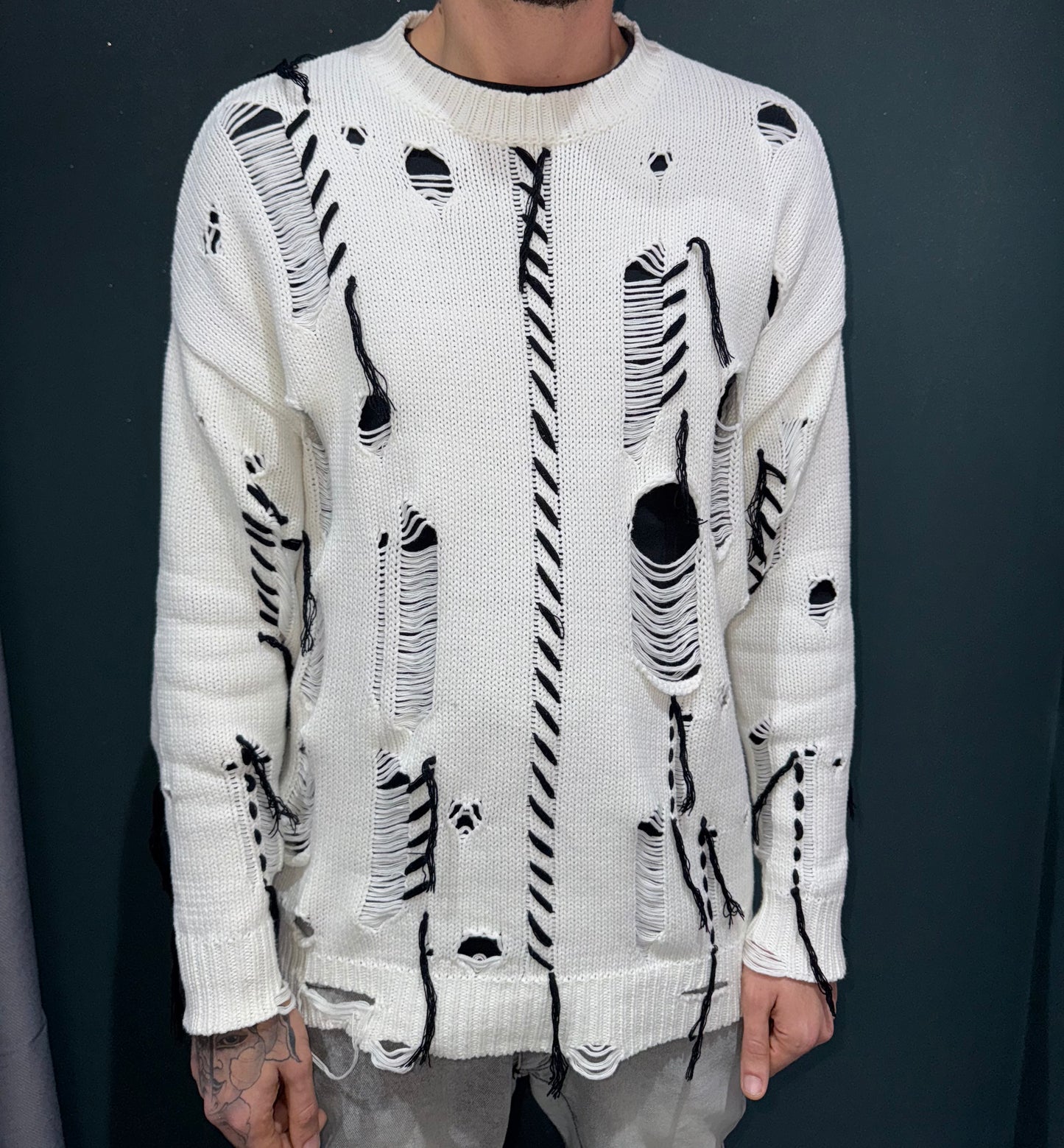 Maglione sfrangiato